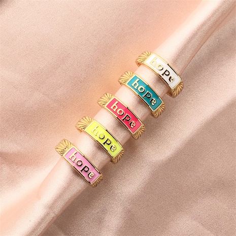 Nihaojewelry wholesale jewelry creative drip enamel letter copper gold-plated ring's discount tags