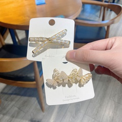 vente en gros bijoux papillon croix imitation perle style coréen épingle à cheveux Nihaojewelry