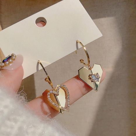 vente en gros bijoux boucles d'oreilles asymétriques en zircon incrusté en forme de coeur nihaojewelry's discount tags