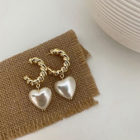 vente en gros bijoux boucles d'oreilles en forme de C en forme de cercle de perles nihaojewelry's discount tags