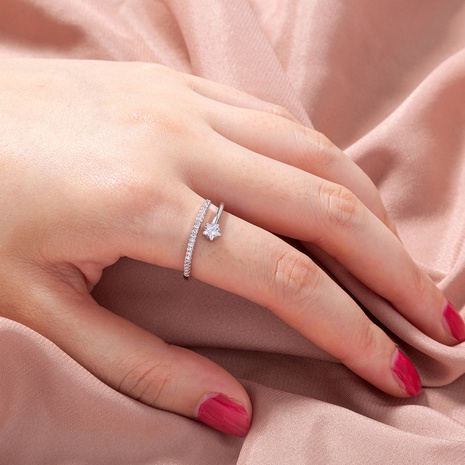 Al por mayor joyería anillo de apertura de circonita con micro incrustaciones de estrella de cinco puntas nihaojewelry's discount tags