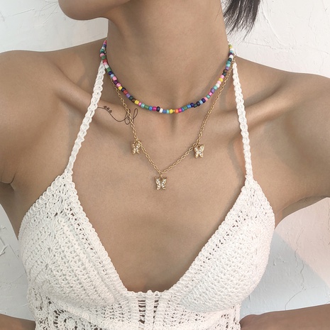 Großhandel Schmuck Böhmische Art Farbe Perlen Schmetterling Anhänger Doppelschicht Halskette Nihaojewelry's discount tags