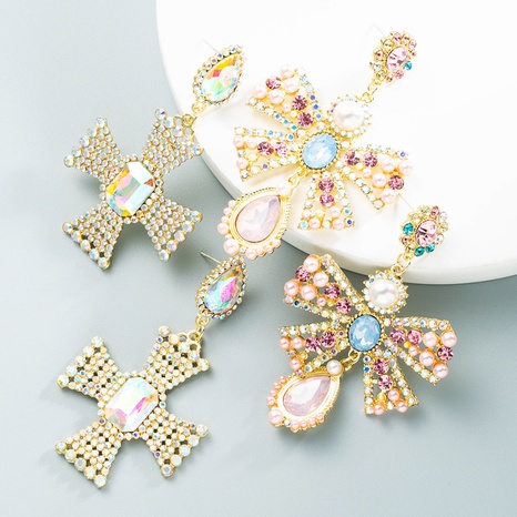Wholesale Fashion Pearl Pink Diamond Bowknot Earrings Nihaojewelry's discount tags