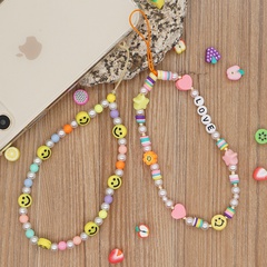 Nihaojewelry wholesale accessories mixed color round beads yellow smiley face mobile phone lanyard