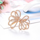 retro alloy diamondstudded hollow bow brooch wholesale Nihaojewelrypicture11
