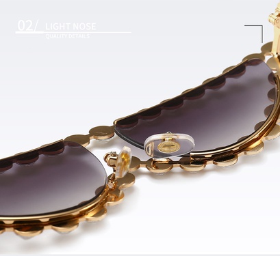 diamond-studded cat eye sunglasses—10