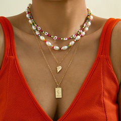 Europäische und amerikanische grenz überschreitende Quasten legierung Anhänger Kontrast Farbe Perlen Set Halskette Retro Reis Perlen Blume Schlüsselbein Halskette Frauen