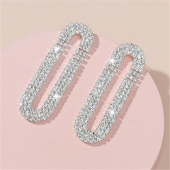 Boucles d'oreilles coréennes en alliage ovale à trois rangées de diamants en gros Nihaojewelry