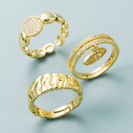 Europäisches und amerikanisches grenz überschreiten des Kupfer vergoldete mikro eingelegte Zirkon runde Marke Augen ring weibliche einfache kreative offene Ring zubehör für Männer und Frauen's discount tags