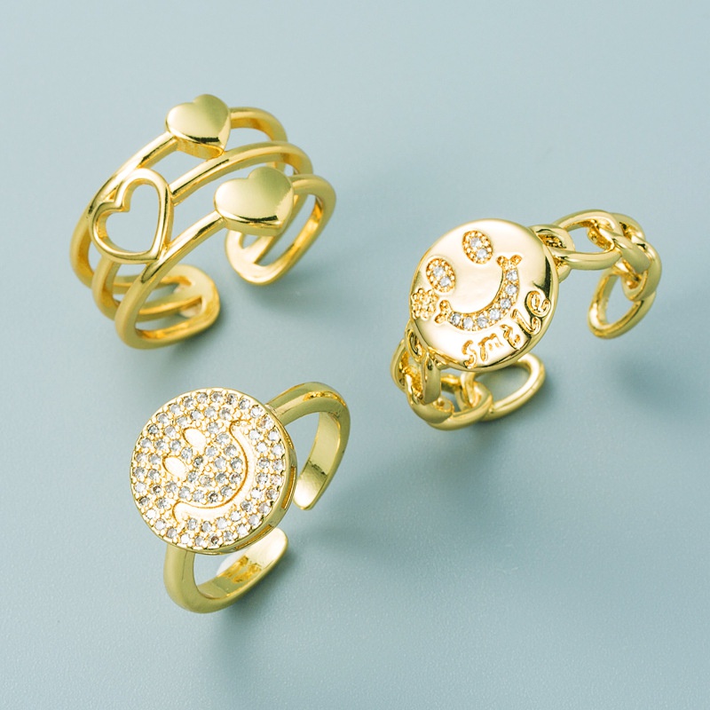 einfacher geometrischer Buchstabe Smiley hohles Herz Kupfer vergoldeter Ring Grohandel Nihaojewelry