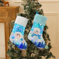 Nuevo estilo de amor de Hong Kong con medias de Navidad de luz azul viejo muñeco de nieve brillante bolsa de caramelo Navidad Shu calcetines decorativos de regalo