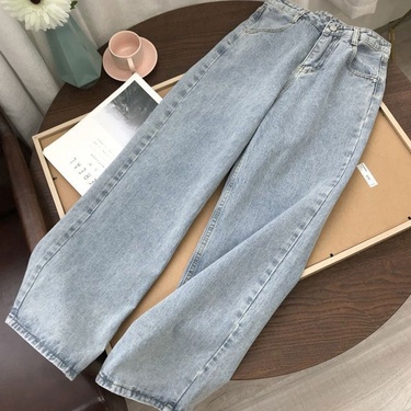 high-waisted slim light-colored jeans—2