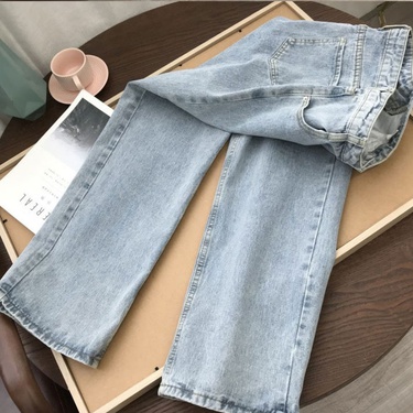 high-waisted slim light-colored jeans—5