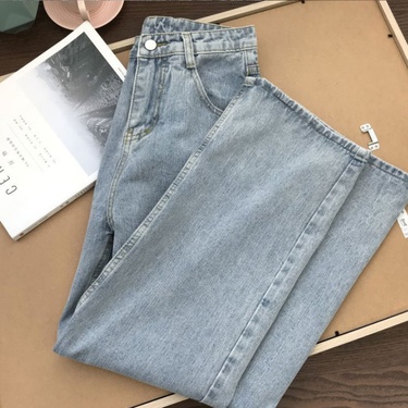 high-waisted slim light-colored jeans—7