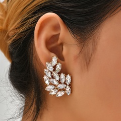 Boucles d'oreilles à la mode pleine de diamants à feuilles creuses en gros Nihaojewelry