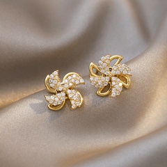 Wholesale Korean Rotatable Windmill Diamond Flower Stud Earrings Nihaojewelry