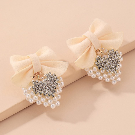 retro pearl inlaid rhinestone heart flannel bow earrings wholesale Nihaojewelry's discount tags