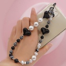 Style ethnique noir en forme de coeur ray perle ronde sangle de tlphone portable en gros Nihaojewelrypicture9