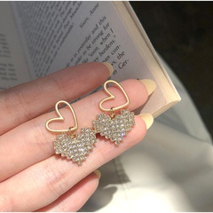 Boucles d'oreilles creuses double coeur coréen en gros Nihaojewelry