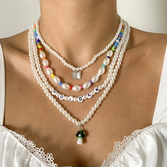 Vintage Kontrastfarbe mehrschichtige Buchstaben Perlenkette Pilz Schmetterling Halskette Großhandel nihaojewelry