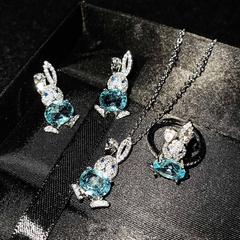 Mikro eingelegt mit Diamanten kleine süße Kaninchen ohrringe imitieren natürlichen himmelblauen Topas Anhänger niedlichen offenen Kaninchen ring weiblich