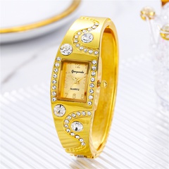 Montre en or à la mode pour dames montre bracelet rétro personnalité diamant montre britannique
