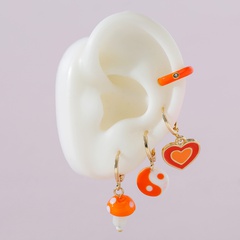 Bijoux fantaisie clip d'oreille coeur de pêche champignon poterie douce boucles d'oreilles yin et yang boucles d'oreilles unilatérales clip d'oreille