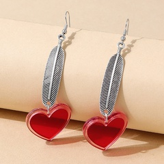 Korean version of creative popular personality feather resin peach heart earrings