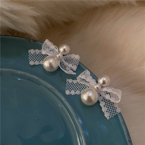 Lace bowknot pearl splicing stud earrings wholesale nihaojewelry's discount tags