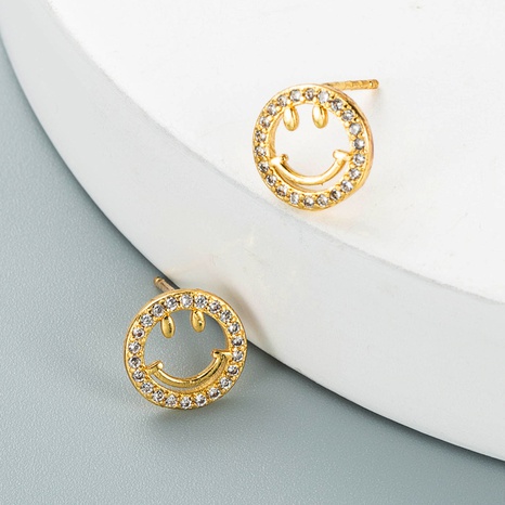 simple copper zircon hollow smiley face earrings wholesale Nihaojewelry's discount tags
