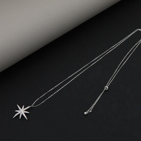 classic fashion solid color inlaid zircon copper star shaped sweater chain's discount tags