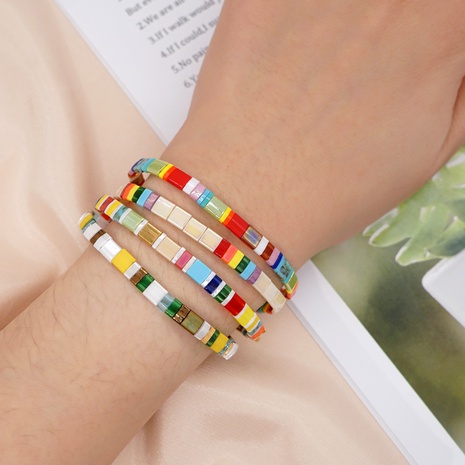 Nueva pulsera de cuentas hechas a mano con cuentas de arcoíris en color de contraste's discount tags