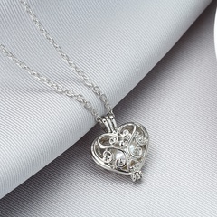retro simple hollow pearl cage heart pendant alloy necklace