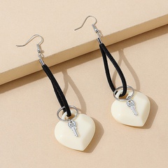 Korean creative small fresh resin peach heart tassel earrings
