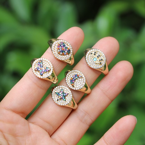 anillo de cobre de circón de corazón de luna de estrella de mariposa de oro hueco de moda's discount tags