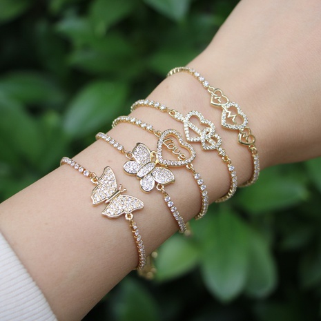 European and American fashion copper gold-plated micro-set heart butterfly zircon bracelet NHWEI592423's discount tags