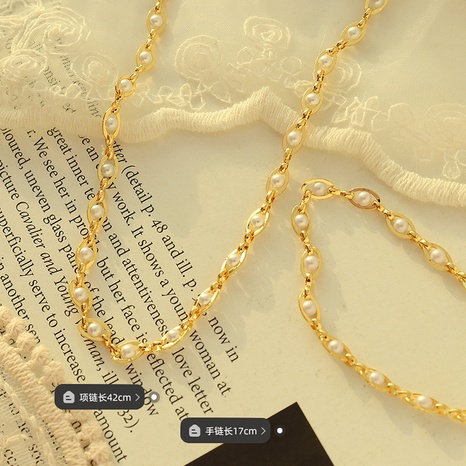 Ensemble de bijoux de bracelet de collier de perles d'imitation baroque de style rétro simple's discount tags