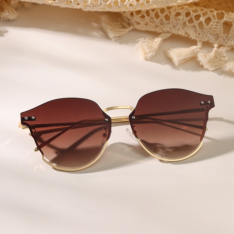 gafas de sol de mujer sin marco con remaches de ojo de gato de medio marco de metal simple's discount tags