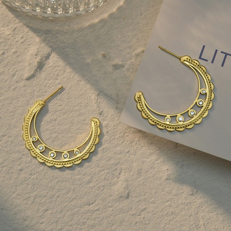 Mode nouvelles boucles d'oreilles creuses en diamant de lune boucles d'oreilles en acier au titane pour femmes en gros's discount tags
