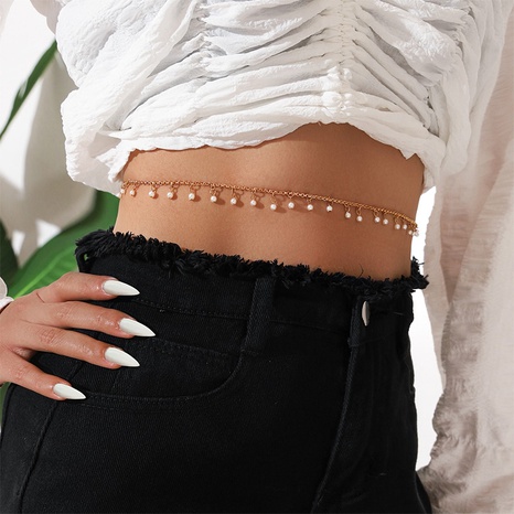 European and American women's fashion simple bohemian pearl tassel body chain  NHPV593905's discount tags