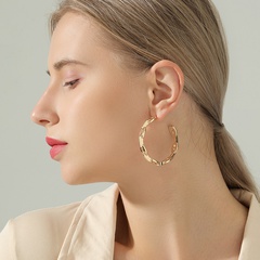 Simple fashionable French C-shaped hollow personality metal texture earrings