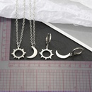 Korea Simple Alloy Hollow Sun Moon Asymmetric Earrings Necklace Wholesalepicture12