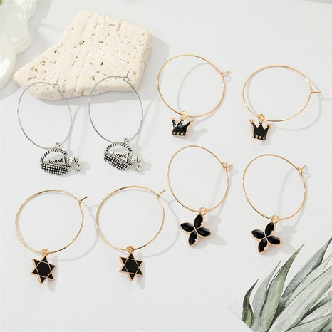 retro black drip oil four-leaf clover six-pointed star crown big hoop earrings's discount tags