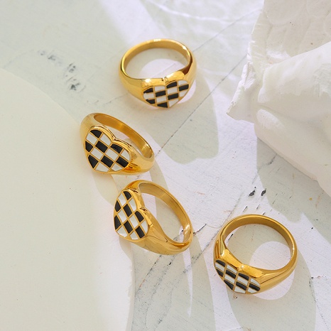 European and American creative ring heart checkerboard titanium steel ring's discount tags