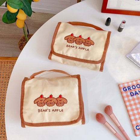 cute folding storage bag simple multi-fold bear cosmetic bag portable storage bag's discount tags