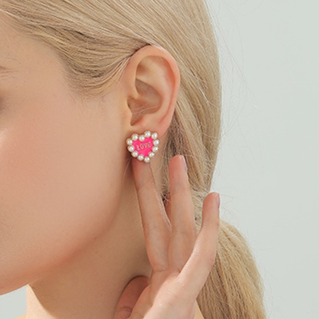 Fashion pearl earrings temperament niche peach heart earrings's discount tags