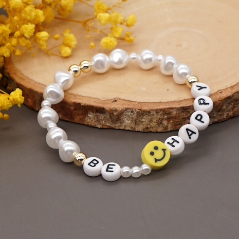 new imitation pearl bracelet wholesale personality simple hand-woven yellow smiley letter bracelet  NHYUX602477's discount tags