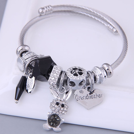 European and American fashion metal shining bunny pendant multi-element bracelet's discount tags