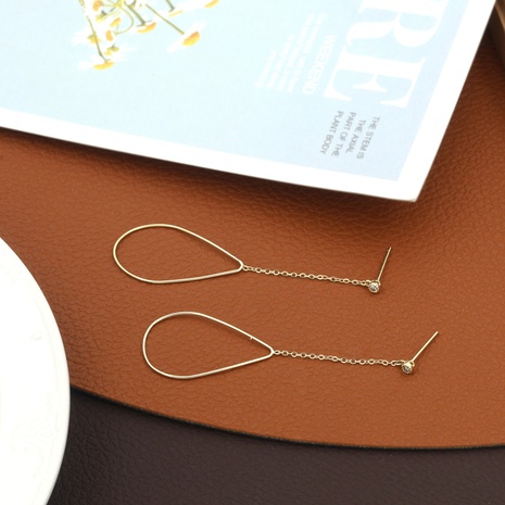 Pendientes largos de cobre con colgante ovalado hueco simple's discount tags