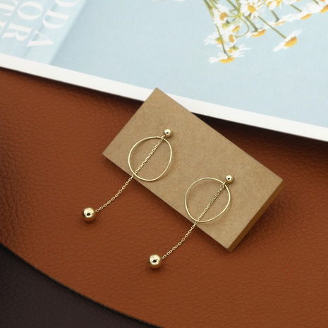 Simple fashion geometric irregular circle ball long copper earrings NHIK616793's discount tags
